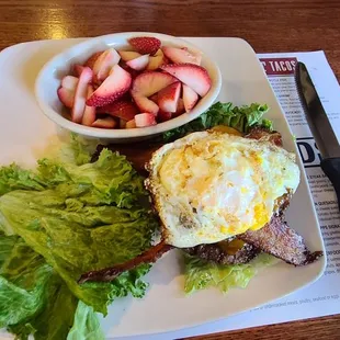 Champps Brunch Burger modified to be KETO friendly. No bun, lettuce wrapped, sliced strawberries instead of potatoes. Delicious!