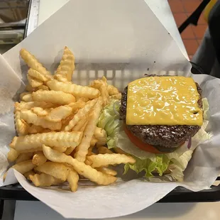 Our juicy 1/3 lb patty Angus Cheeseburger!! It&apos;s so good!!!