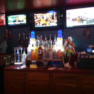 More improvements. Hanging island thing, gone, all new TVs. Clutter gone.