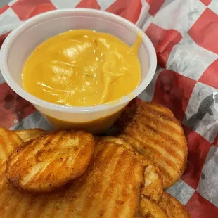 Buffalo chips are really crispy thin potatoes with a little seasoning and nacho cheese  ! Delicious