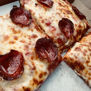 Big pieces with lots of fresh cheese.