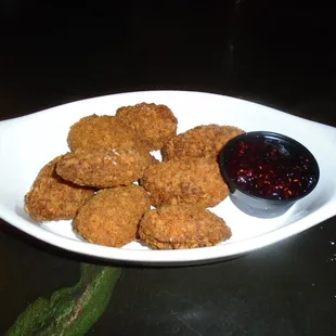 Jalapeno poppers with raspberry dipping sauce.