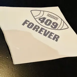 a napkin with a football logo on it