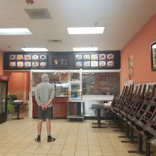 Inside of restaurant during COVID19 indoor dining shutdowns. Taken to show the COVID19 precautions with the plexi-glass.