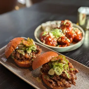 Bulgogi sliders and chicken wings happy hour portion