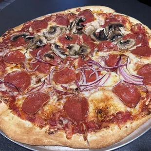 Pepperoni pizza, half onion and half mushroom