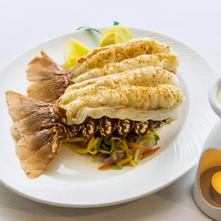 a plate of grilled fish