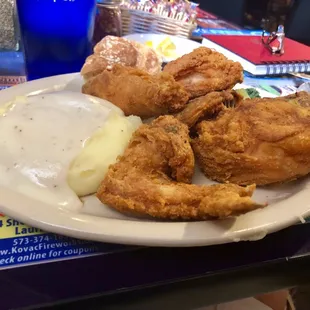 Fried chicken, mashed potatoes and gravy, soft roll and side salad!