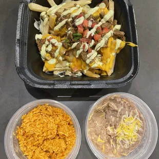 Asada fries, rice and beans.
