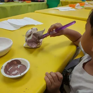 Mommy and me ceramics, 3yo applying glaze