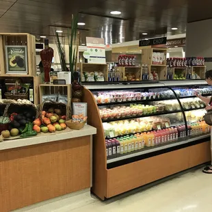 a woman shopping in a grocery store