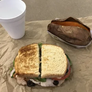 a sandwich and a sweet potato