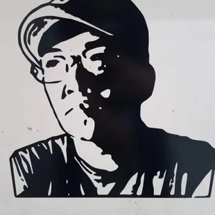 a black and white drawing of a baseball player