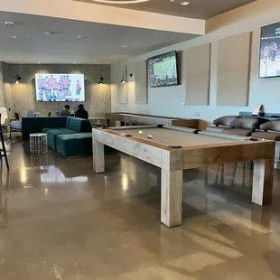a pool table in the lobby