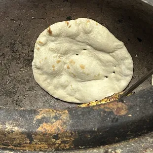 Milky Naan in the Tandoor baked fresh when ordered.