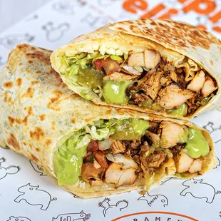 a chicken burrito cut in half