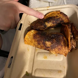 Burned birria tacos
