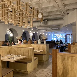 Interior view - airy industrial setting with more intimate side tables