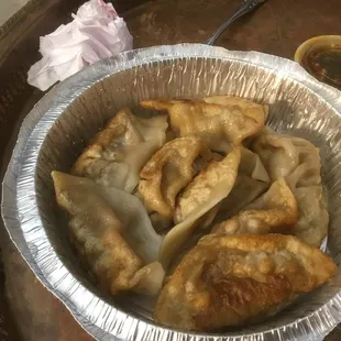 Fried dumplings with dipping sauce