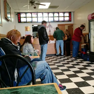 a group of people in a restaurant