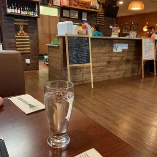 a glass of water on a table