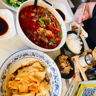 Biang biang noodles, sliced beel, cucumber salad.