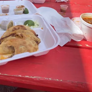 a plate of food on a picnic table