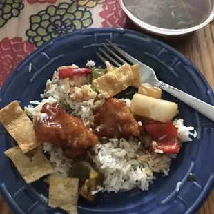 This dish is the succulent Honey Chicken with white rice, crispy chips and the tastiest sweet and sour soup ever!