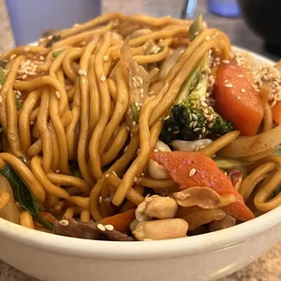 a bowl of noodles and vegetables