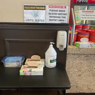 Gloves, masks, sanitizer station before you go through the line.