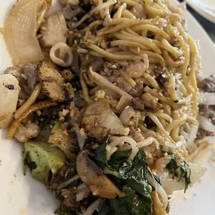 Shrimp, squid, beef, broccoli, spinach, onions, mushrooms, etc