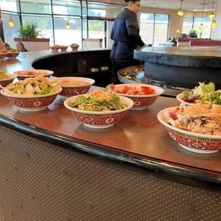 bowls of food on a counter