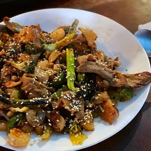 a plate of stir fried vegetables