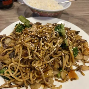a plate of stir fried noodles