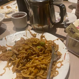 a plate of noodles on a table