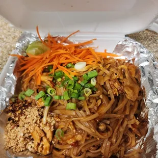 Pad thai with chicken to go. I love the little chunks of tofu mixed in!