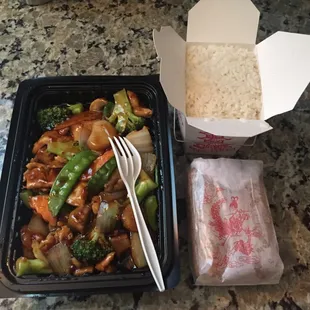 Hunan chicken, egg rolls.