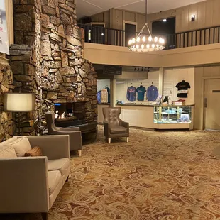 Entrance with fireplace and seating