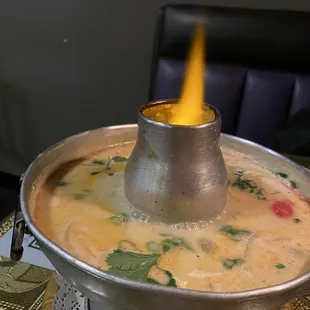 Beautiful hot pot of Tom Kha.