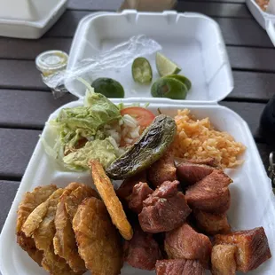 Tostones, Chicharon, rice, lettuce and avocado amazing!
