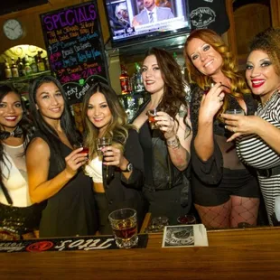 a group of women drinking beer