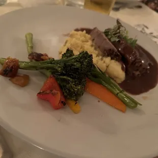 "Land" entree of beef tenderloin, vegetables soaked in thick, room temp butter, and mashed Yukon potatoes