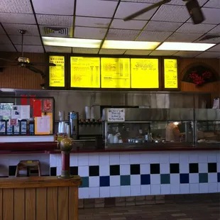 a restaurant counter with menus
