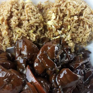 rice, meat, and vegetables in a styrofoam container