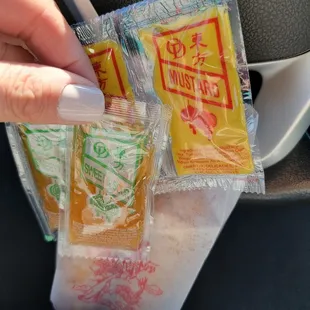 Sweet and sour sauce and mustard