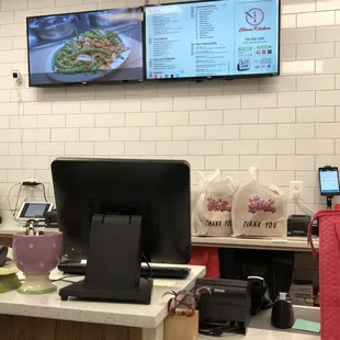 Interior counter with takeout orders.