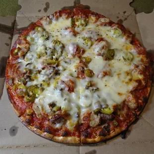 A 10&quot; Meat Feast, thin crust with a couple of extra toppings (they forgot one of them).