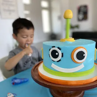 Custom robot cake with funfetti cake and buttercream.