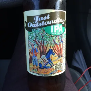 a bottle of just outstanding ipa