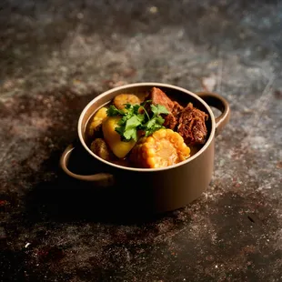 Sancocho: beef short rib, corn, potato, yuca, green plantain, cilantro